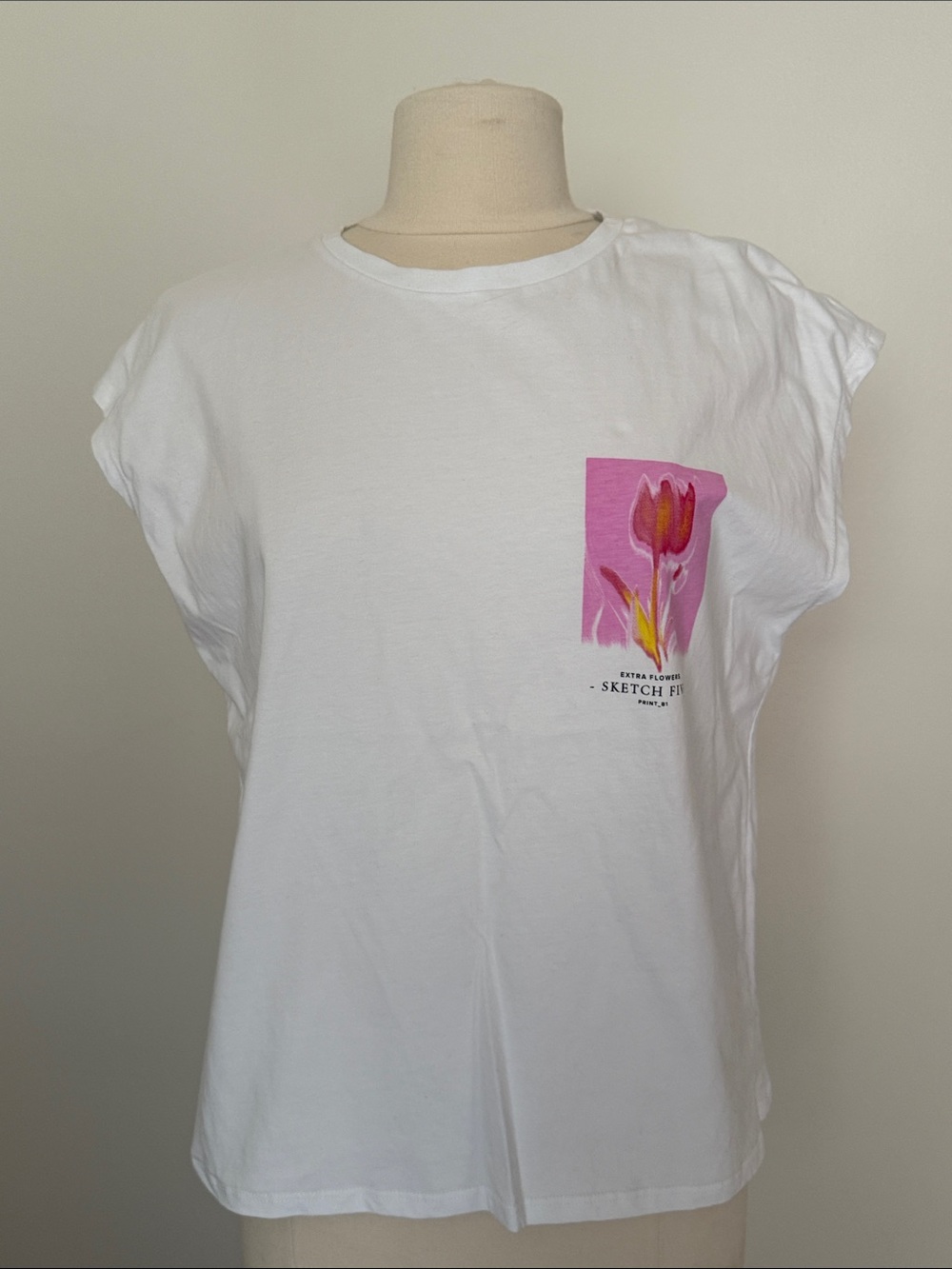 Zara White Tee with Pink Floral Pocket Graphic